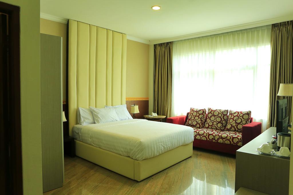 Hotel 55 Джакарта Номер фото