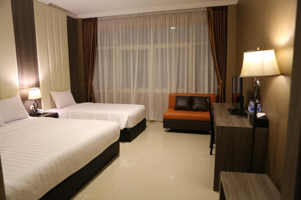 Hotel 55 Джакарта Номер фото